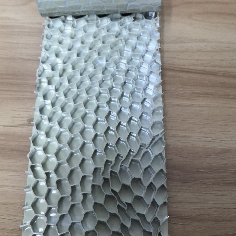 Aluminum honeycomb core extrusion deformation